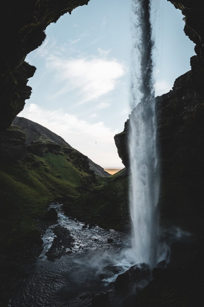 @nickheinimann.photography and waterfall Iceland