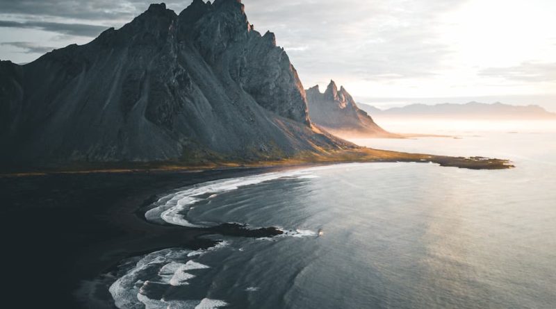 Soaring above the black sand beaches, Iceland, Stoksness, @alex_leeder_