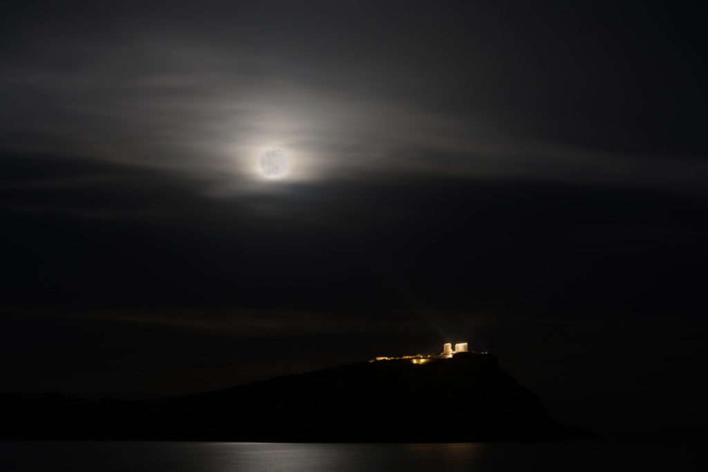 @nick.sorotos - The Moon above the Temple of Poseidon in Cape Sounio at Greece ( Nick.Sorotos)